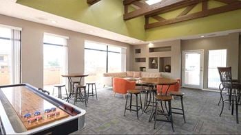 Clubhouse with shuffleboard table